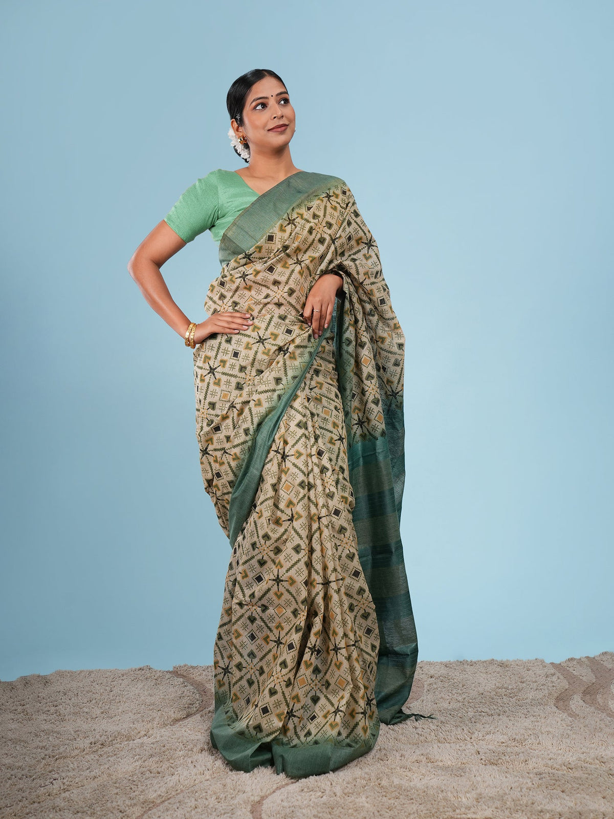Sage green bamboo silk saree, a good saree fabric for beginners, shown in drape — Koshnika