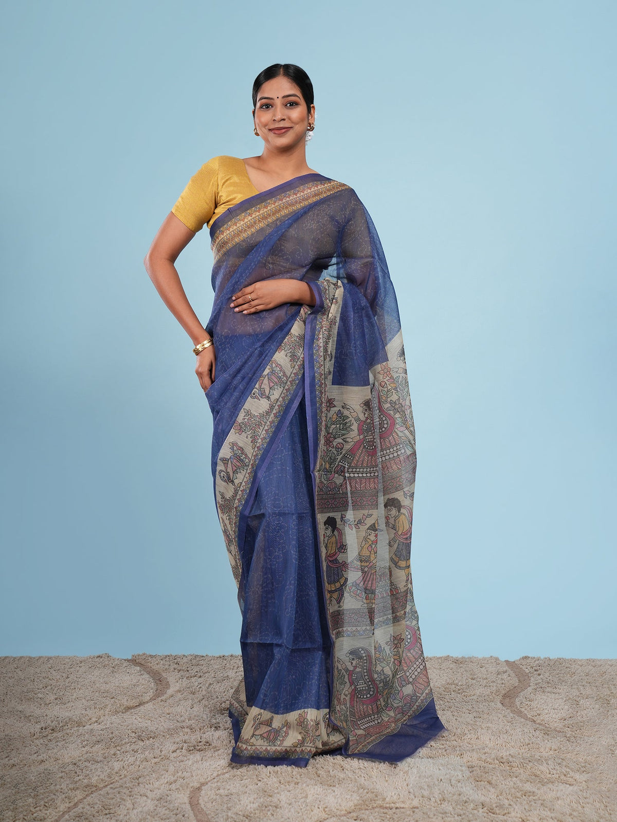 Royal blue Tussar silk Madhubani-print saree, a fabric that needs careful stain care — Koshnika