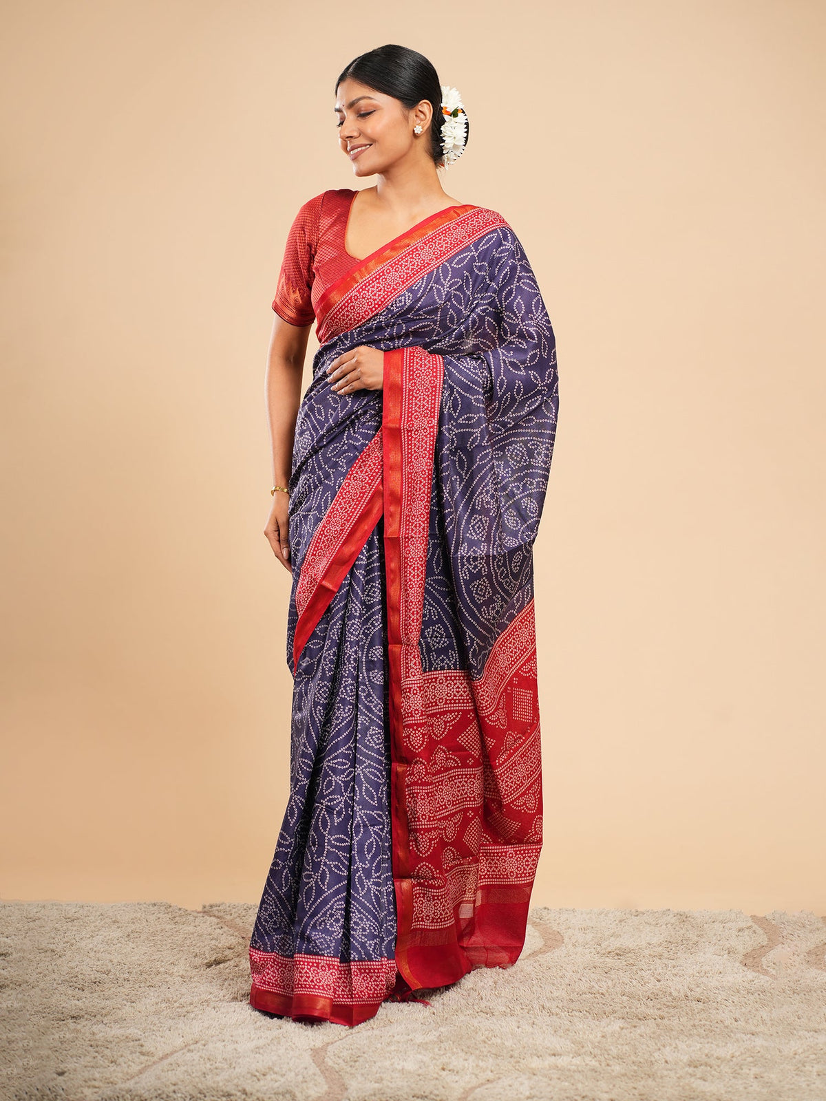 Midnight blue Modal saree with Bandhni-inspired print and red zari border — Koshnika