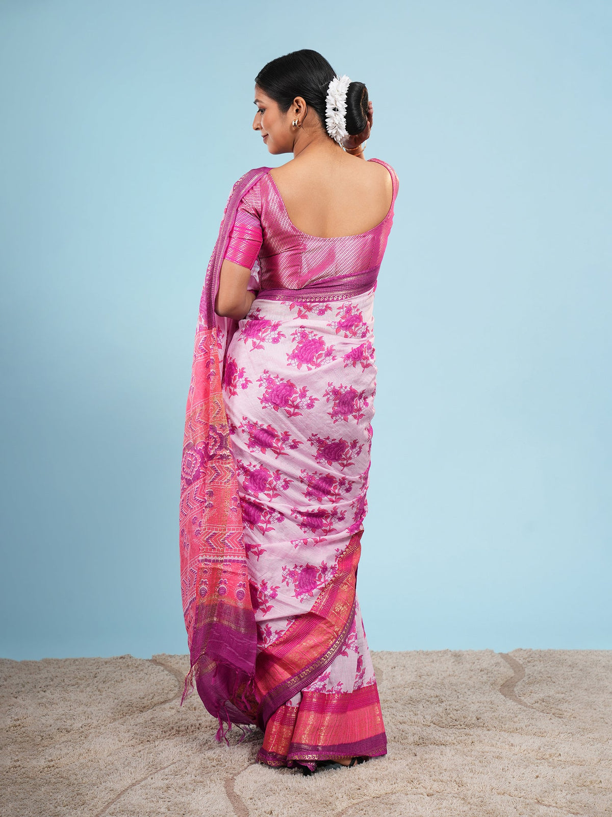 Pink Vegan Silk saree with jacquard border, draped full-length for a Navratri evening — Koshnika