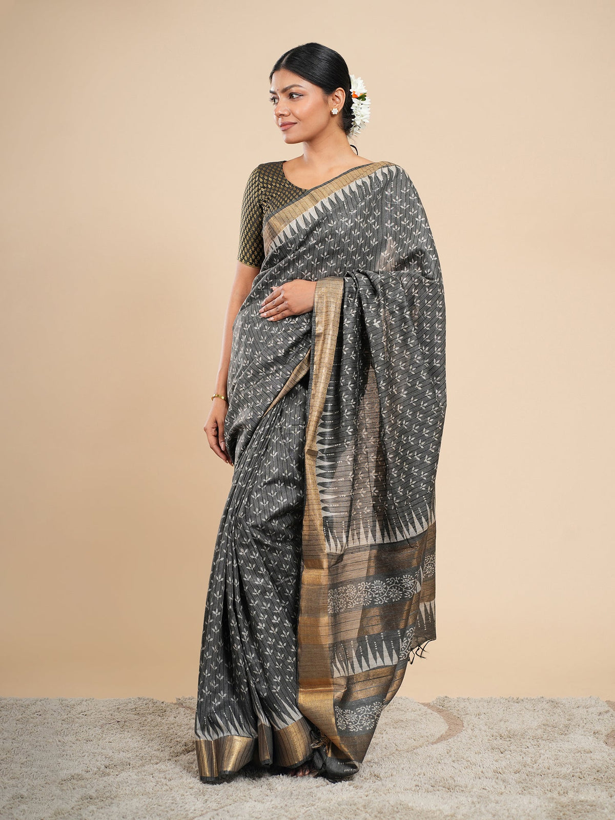 Charcoal grey Chanderi saree with antique gold border, showing the sheer Chanderi weave — Koshnika