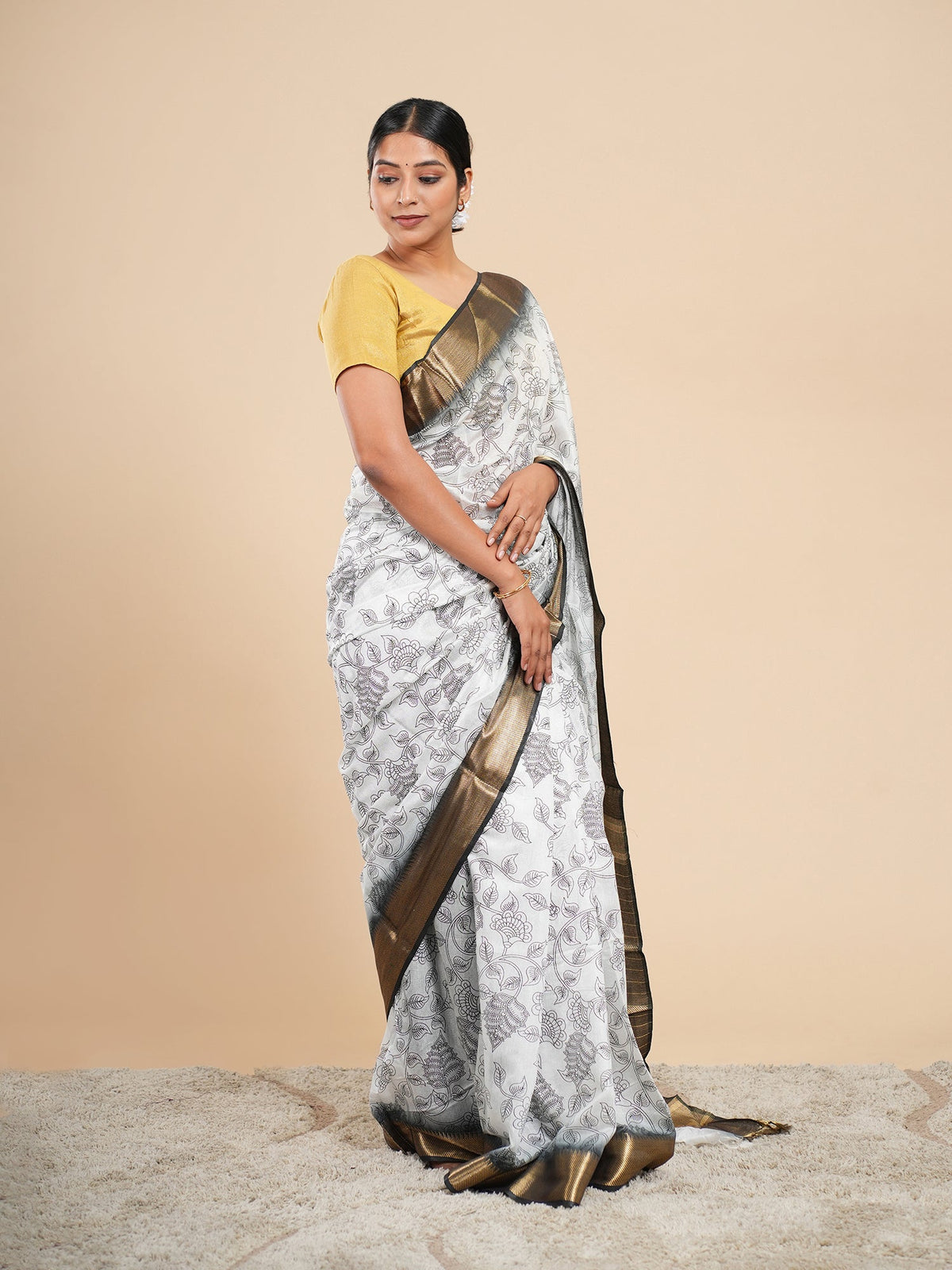 White Kalamkari-print saree drape, the pen-work look in Kalamkari vs block print — Koshnika