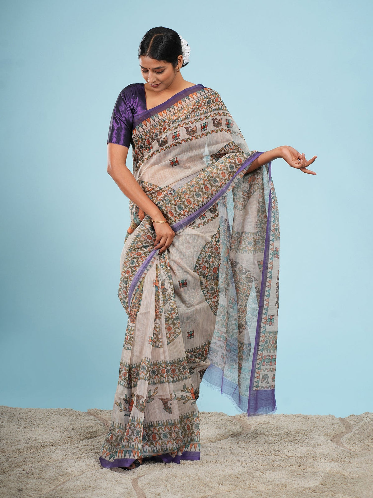 Anvaya beige and purple Tussar silk saree in full drape, showing the natural gold cast of Tussar silk — Koshnika