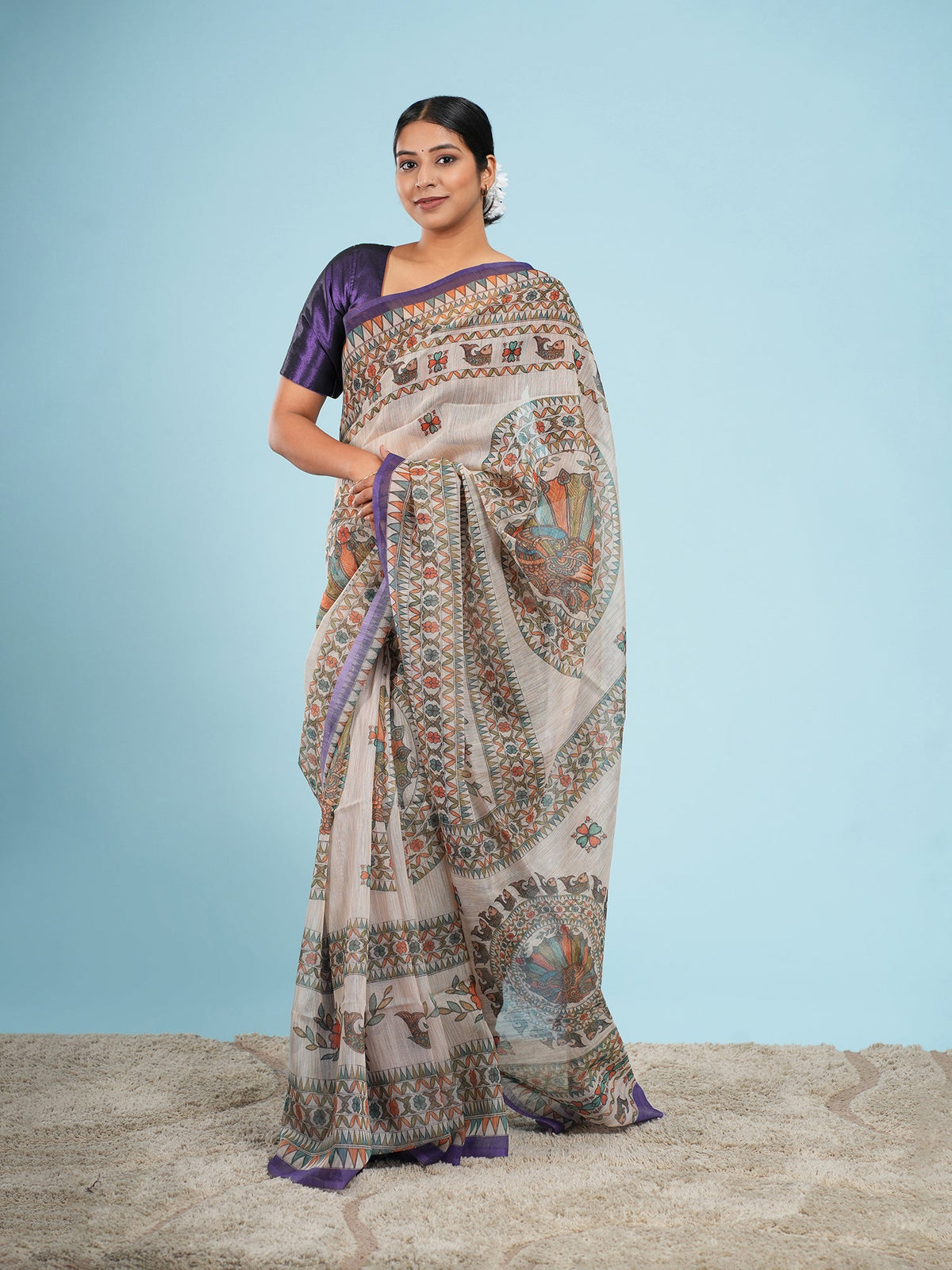 Tussar silk saree border showing the natural slub texture that ghicha silk exaggerates, on a warm golden ground — Koshnika