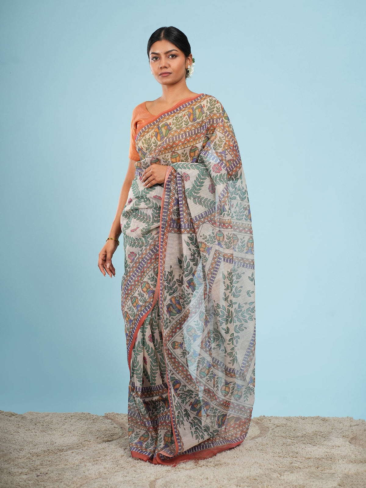 Rust Tussar silk saree with Madhubani-inspired print, an example of the entry tussar silk saree price band — Koshnika