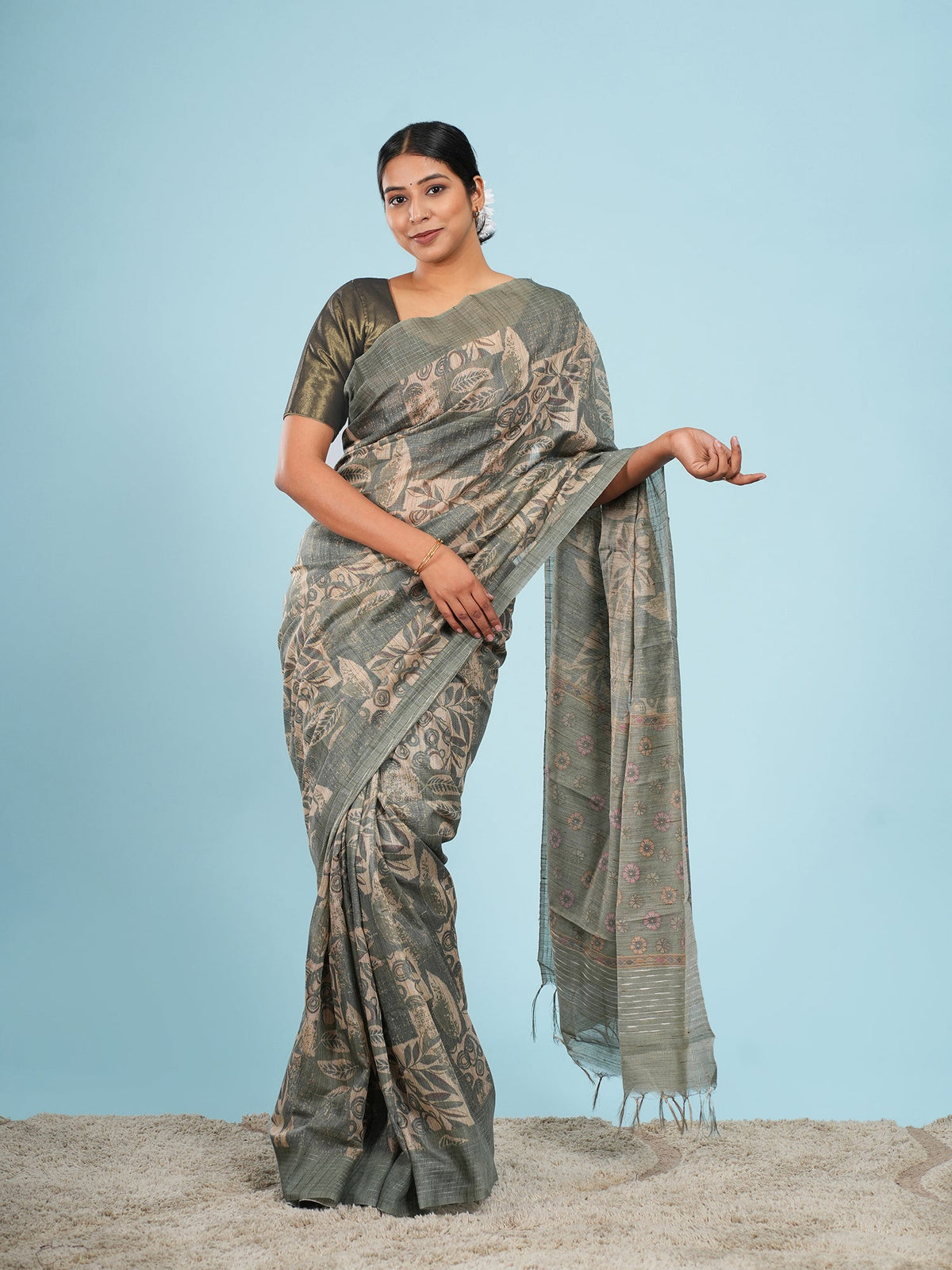 Sage green bamboo silk saree with a botanical print, draped full-length — Koshnika