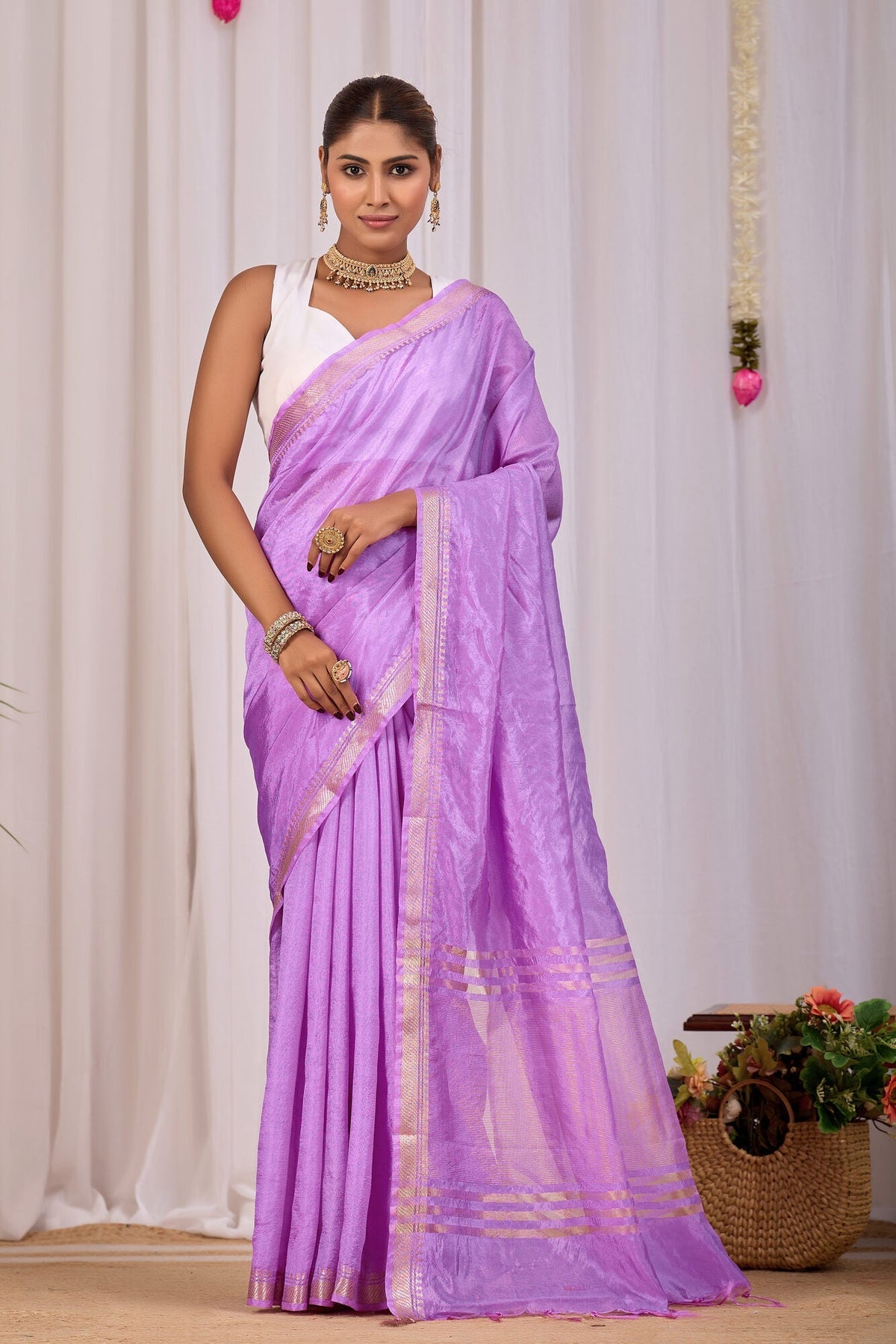 Lilac banana silk saree with a broad gold zari border, the kind this banana silk saree care guide covers — Koshnika