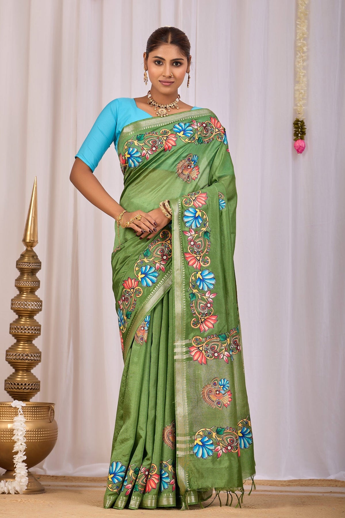 Olive green banana silk saree, front drape, showing the dry grained surface that banana fibre gives — Koshnika
