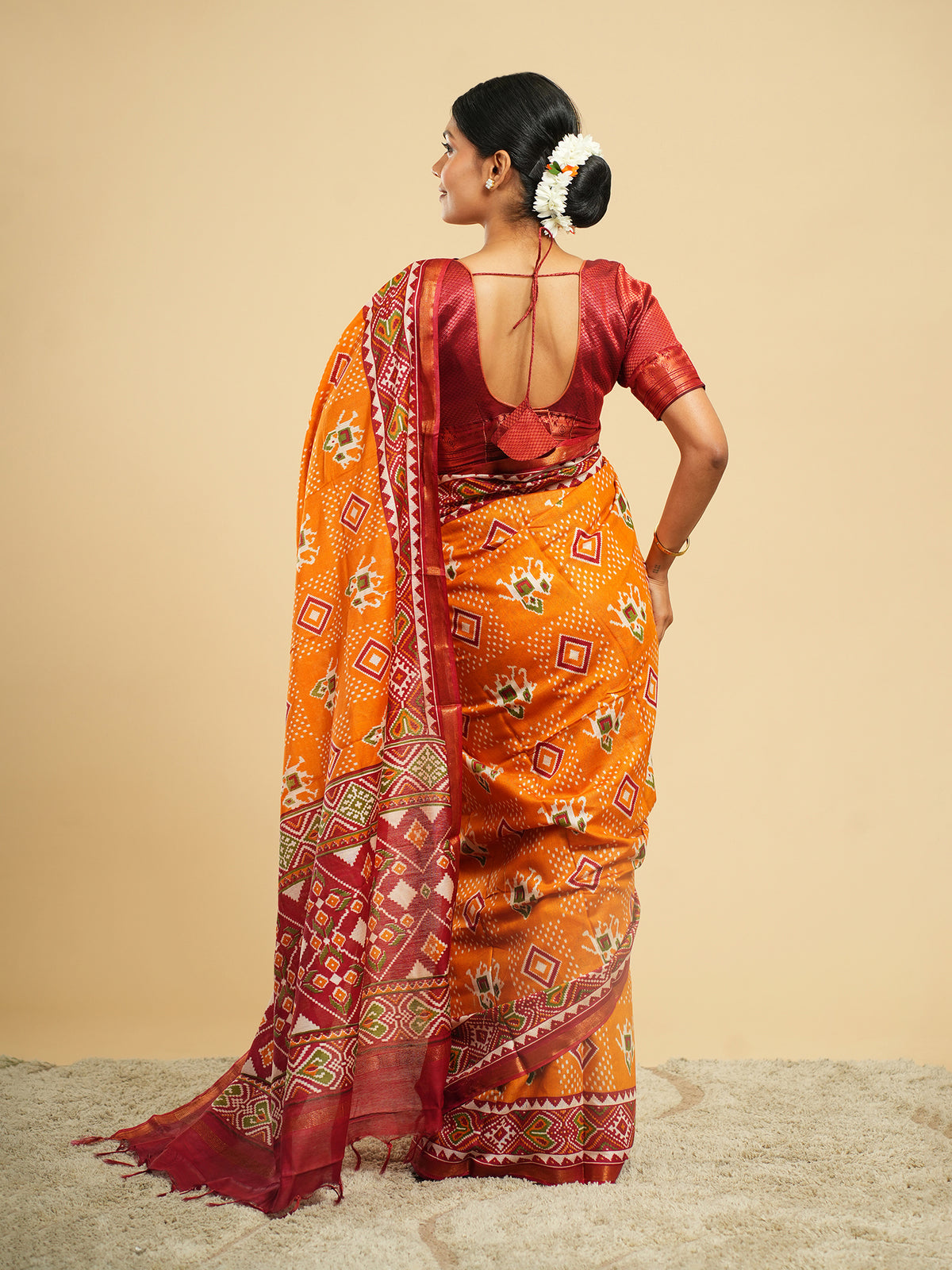 Orange Modal Patola-print saree, Patola motif close-up – Koshnika